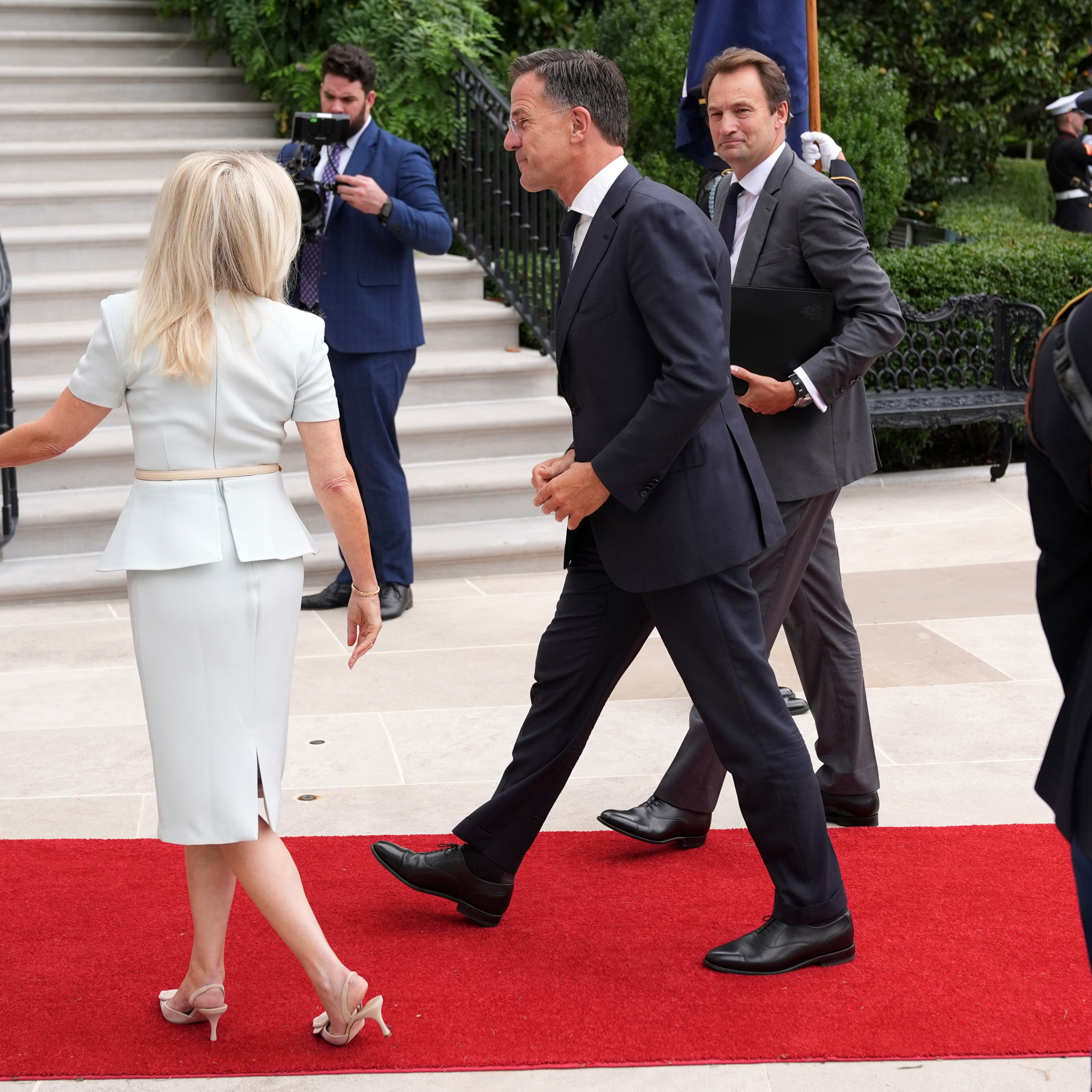 Monica Crowley, White House chief of protocol, from left, greets NATO Secretary General Mark Rutte upon arriving to meet with President Donald Trump and Ukraine's President Volodymyr Zelenskyy, Monday, Aug. 18, 2025, at the South Portico of the White House in Washington. (AP Photo/Jacquelyn Martin)
