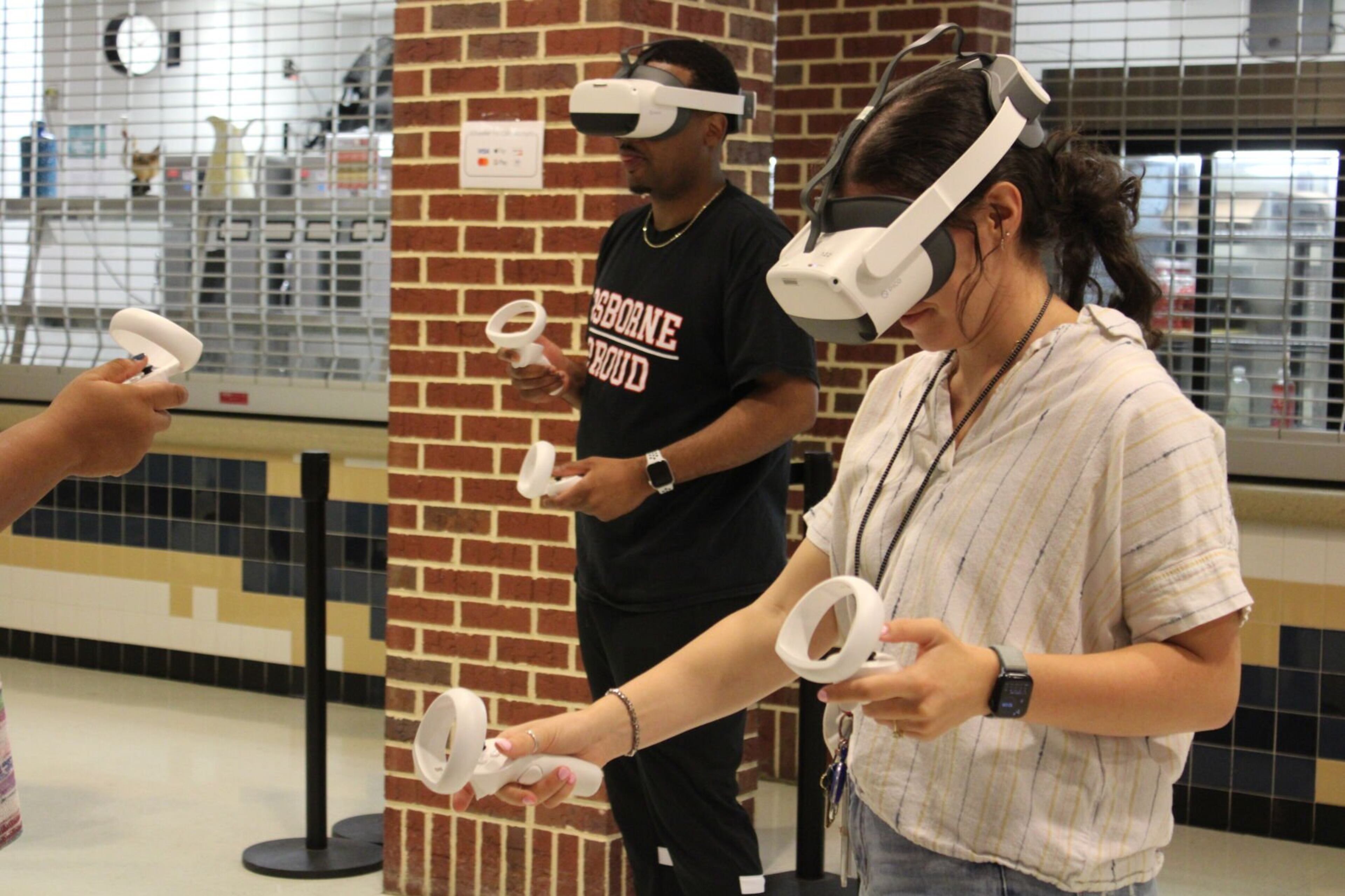 Roughly 400 of Cobb’s math and science teachers were trained to use Prisms VR headsets Monday at Wheeler High School.