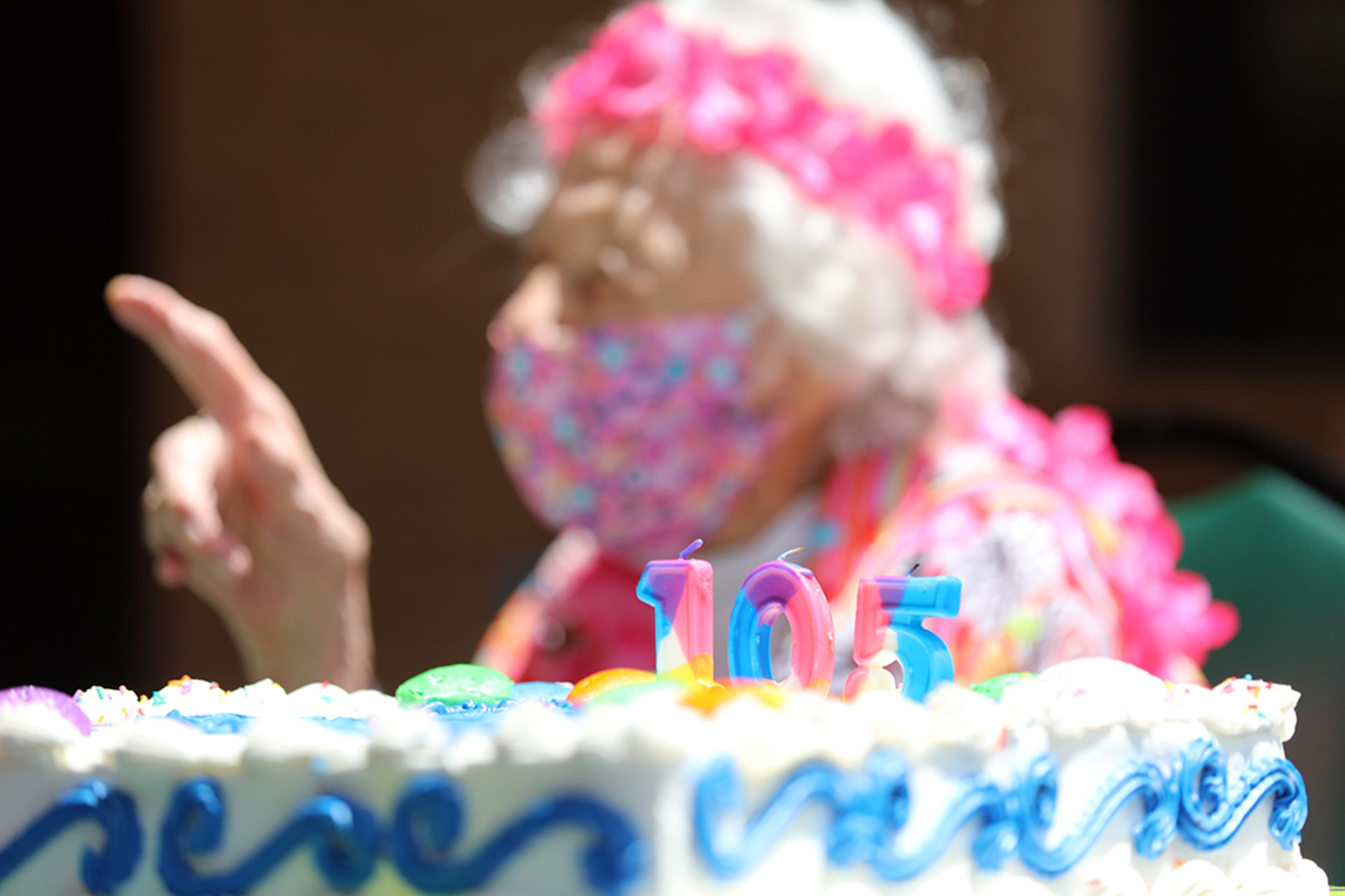 Peggy Cobb is the oldest resident at the Hammond Glen Retirement Community. Staff, friends and family members celebrated her birthday a day early on Friday, May 22, 2020. As the top of her cake shows, she turned 105 this year. (Photo: Miguel Martinez for The Atlanta Journal-Constitution)