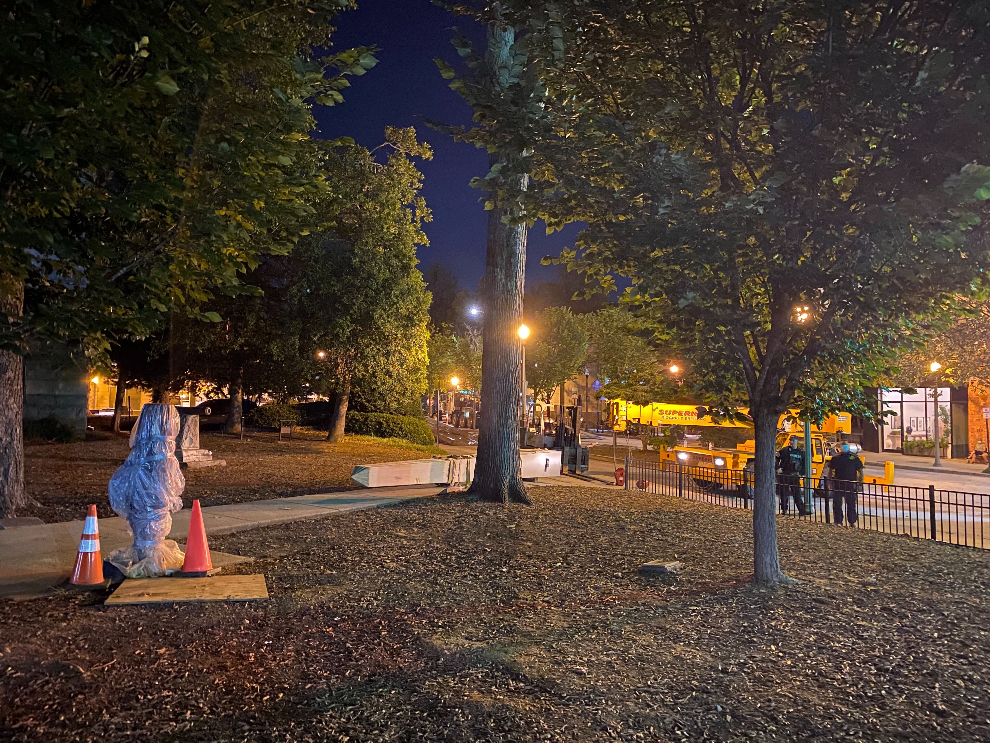 A 30-foot obelisk Confederate moment, which has stood for 112 years, was taken down in the downtown Decatur square late Thursday night. The monument was erected in 1908 by the United Daughters of the Confederacy. Photos by Amanda Coyne / AJC