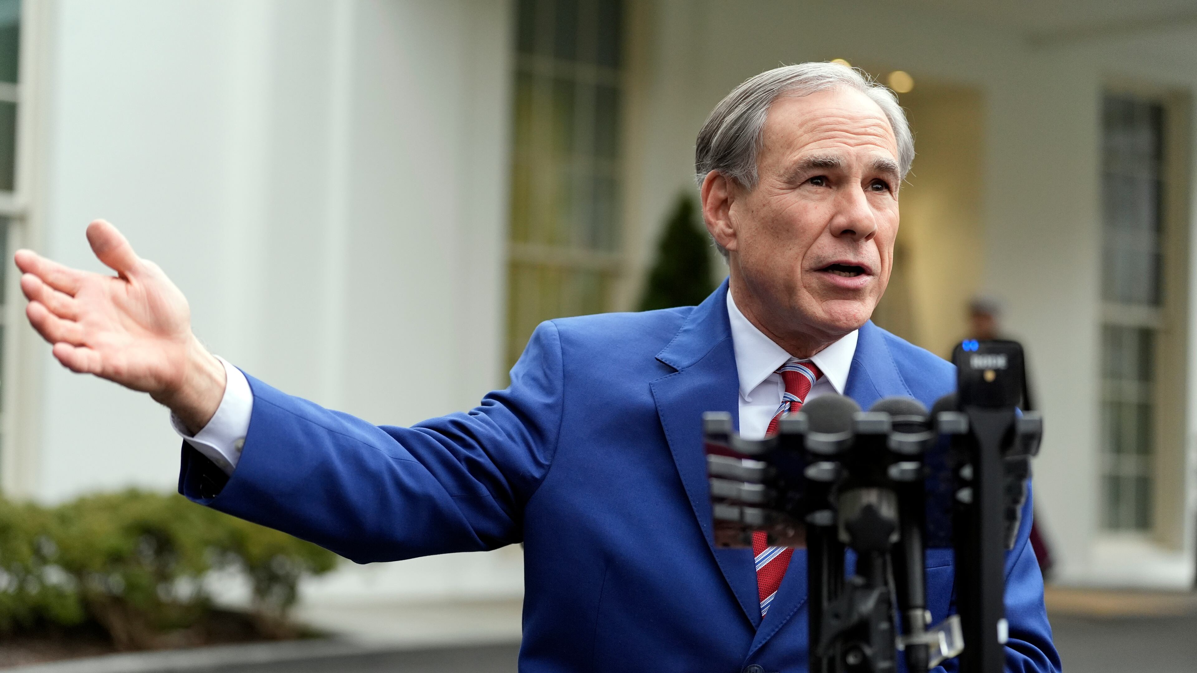 FILE - Texas Gov. Greg Abbott speaks to reporters outside the West Wing of the White House, Feb. 5, 2025, in Washington. (AP Photo/Alex Brandon, File)
